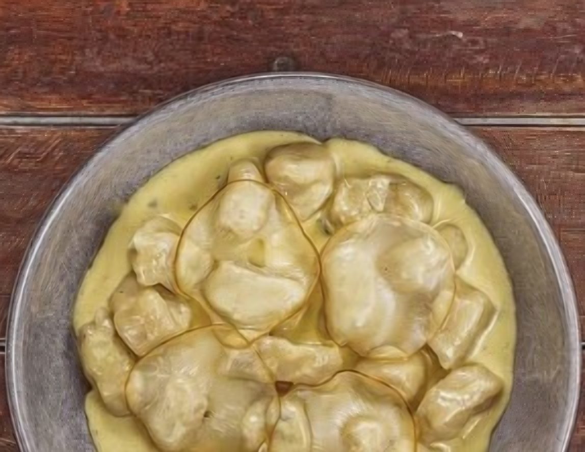 Spinach and ricotta ravioli in a creamy sauce